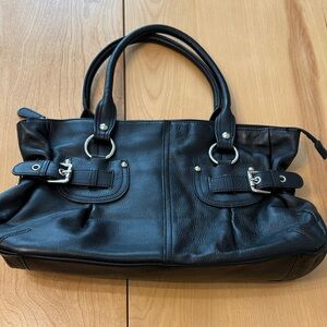 Etienne Aigner black pocketbook with double handles.